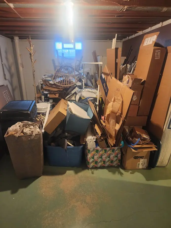 Roll-off dumpster container at job site for Concrete Dumpster Rental in Lowell